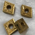 Gold coated CNMG carbide turning inserts for steel machining