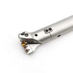 Close-up view of indexable drill with carbide inserts for CNC hole machining